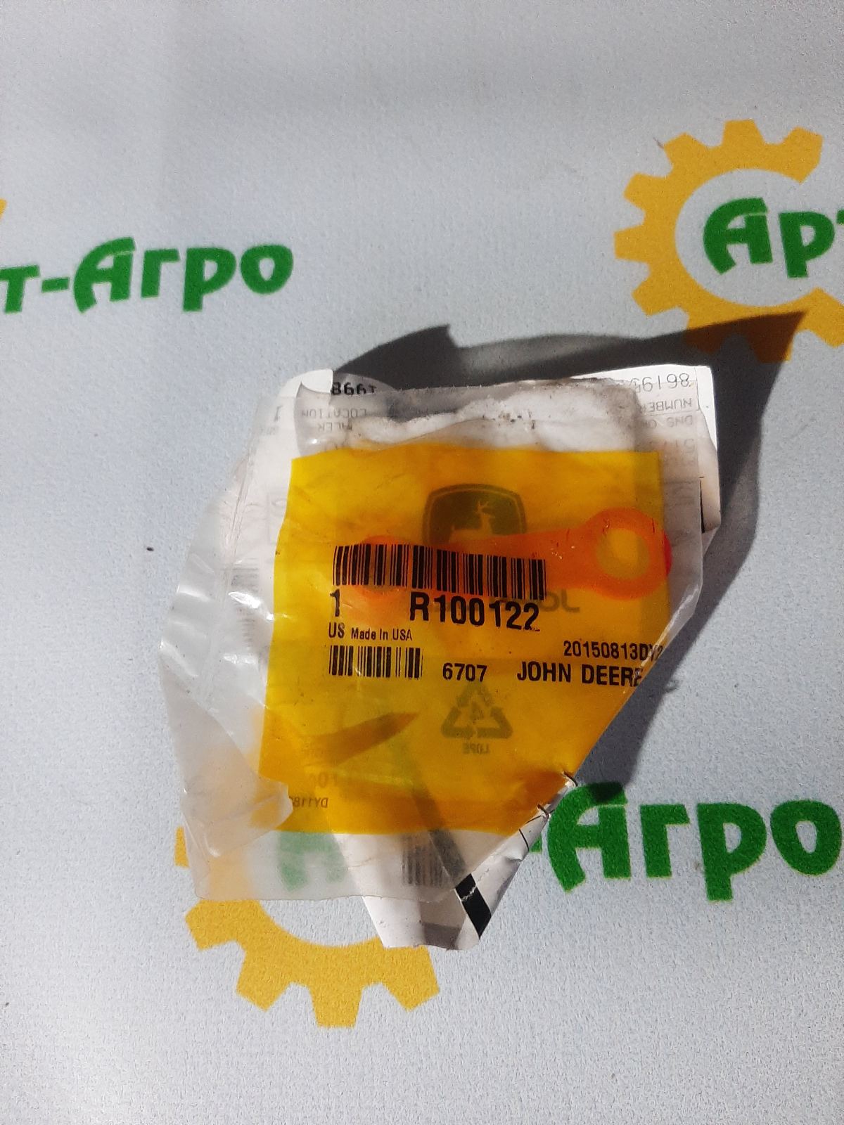 R100122 John Deere Nakrętka zaworu przedniej osi