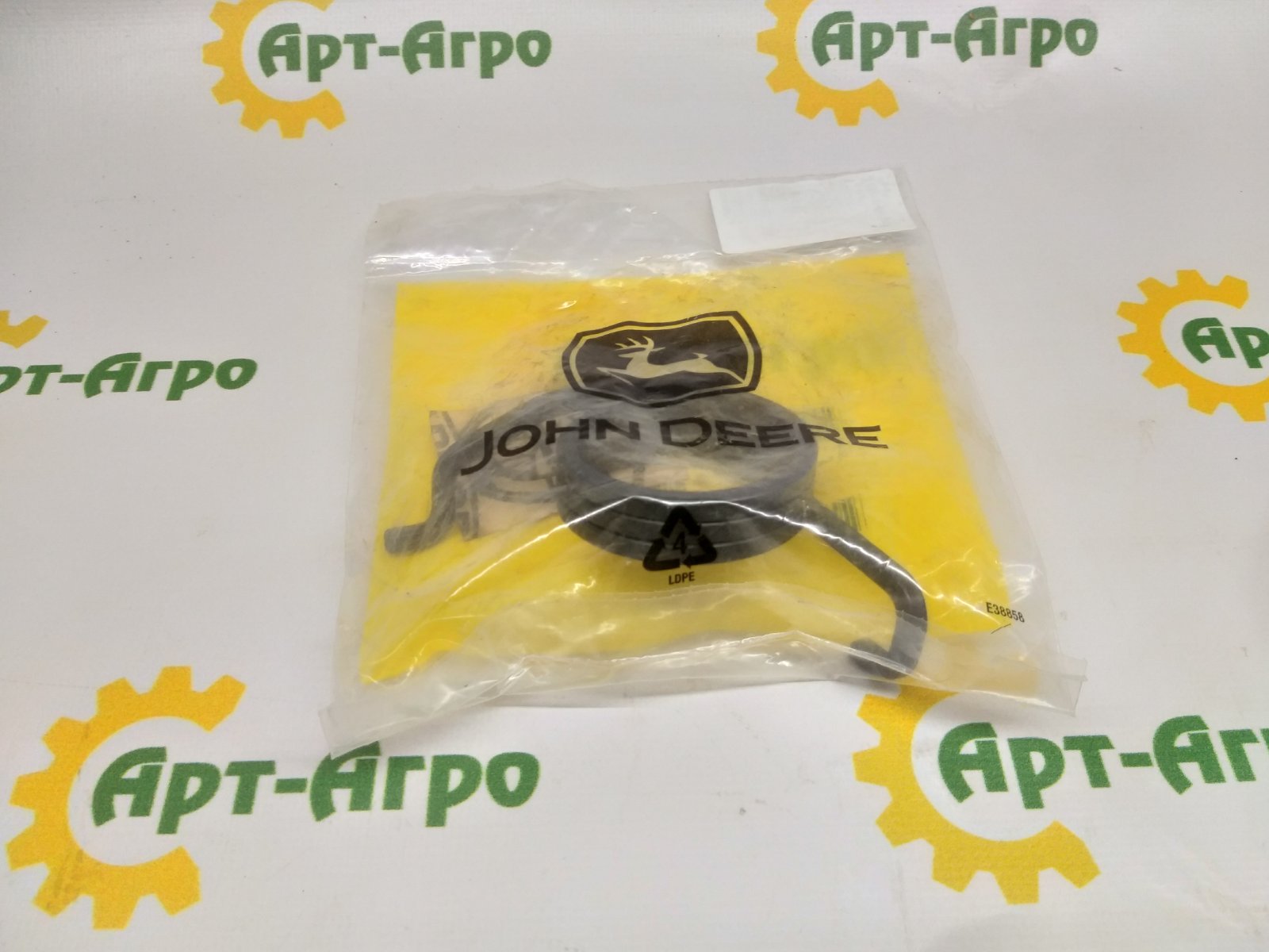 R107548 Sprężyna skrętowa John Deere